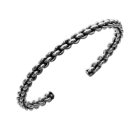 [full] - Braided sterling silver open cuff bangle with polished and oxidised details.