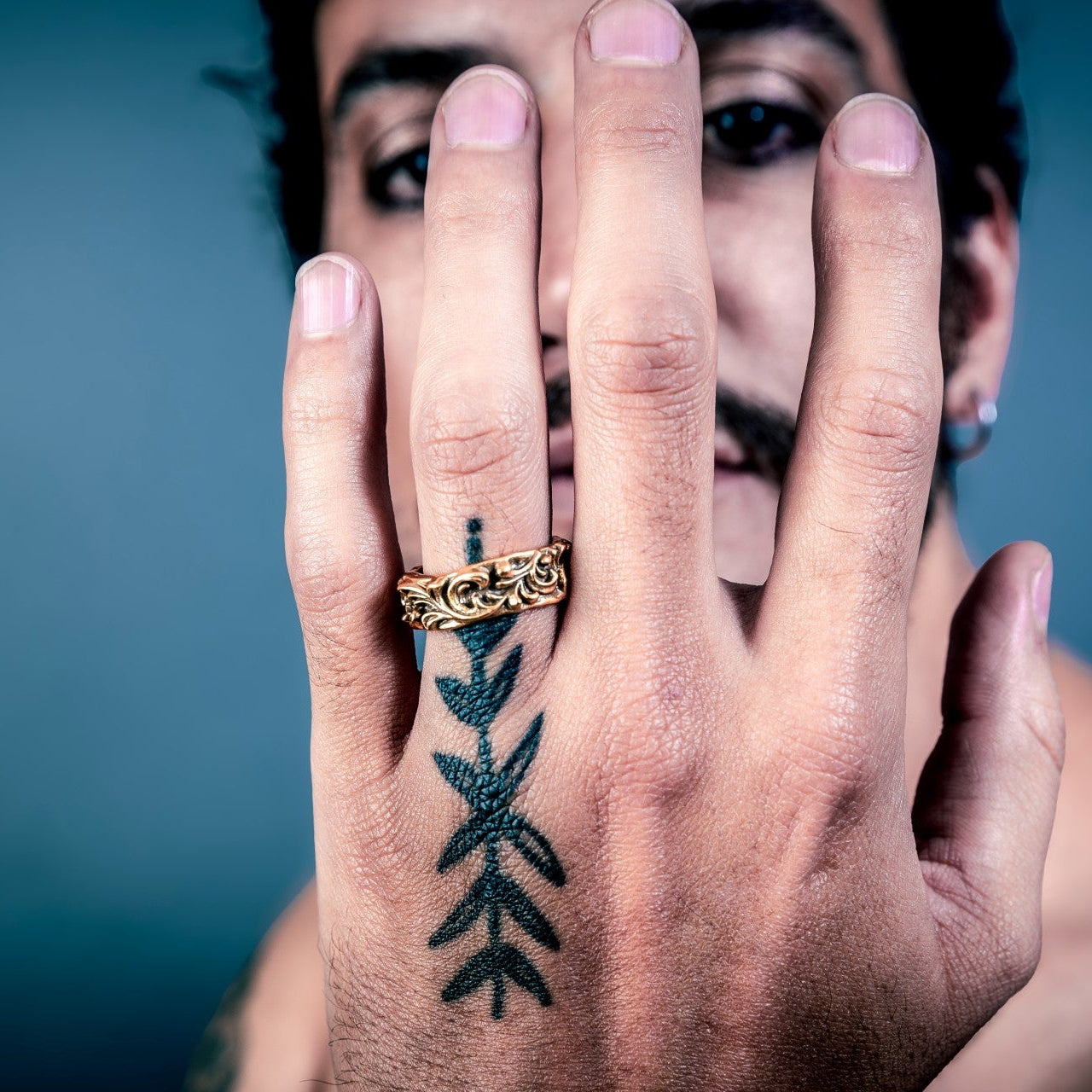 [full] Person with a sterling silver ring on their finger