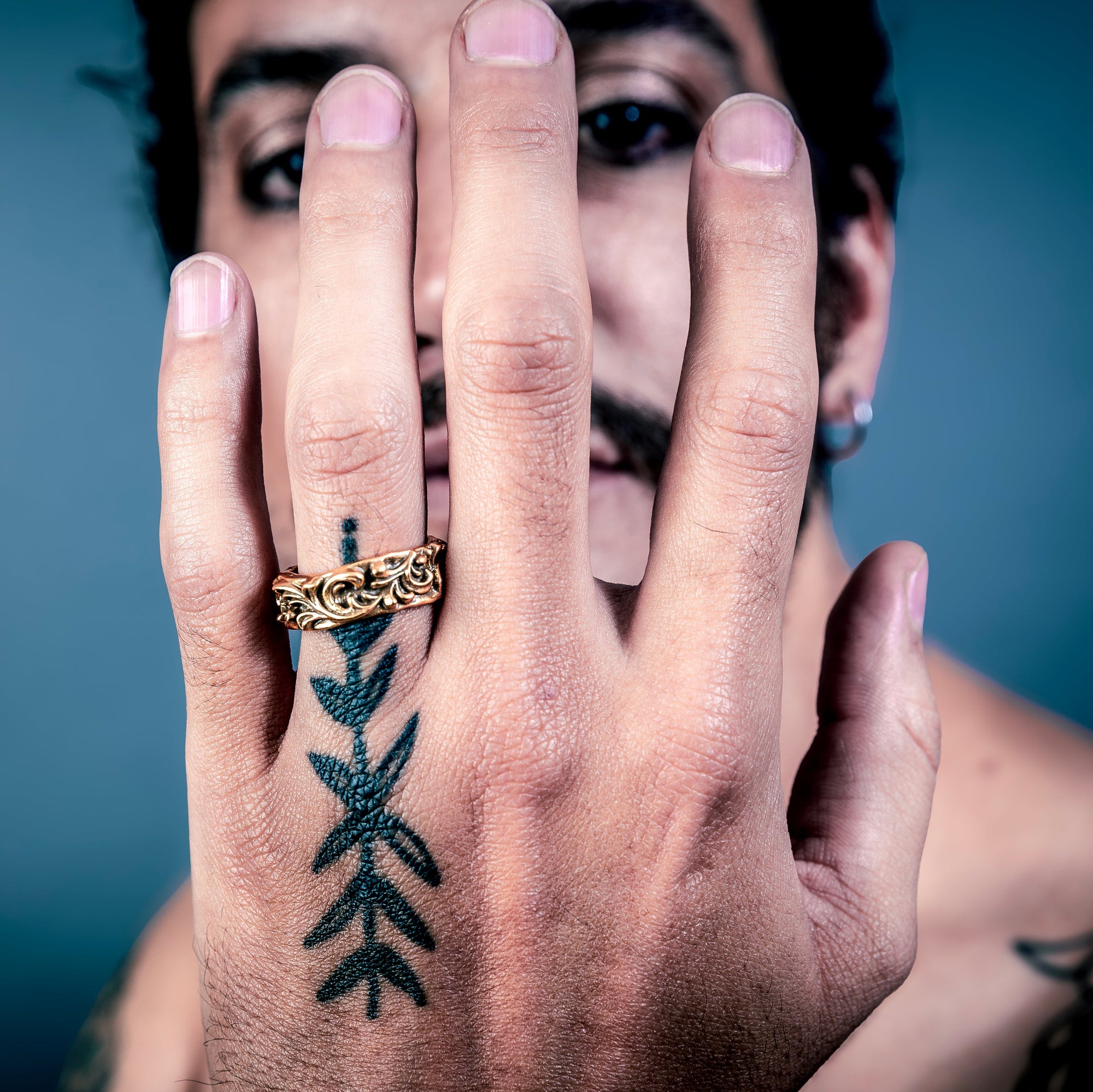 [full] Person with a sterling silver ring on their finger