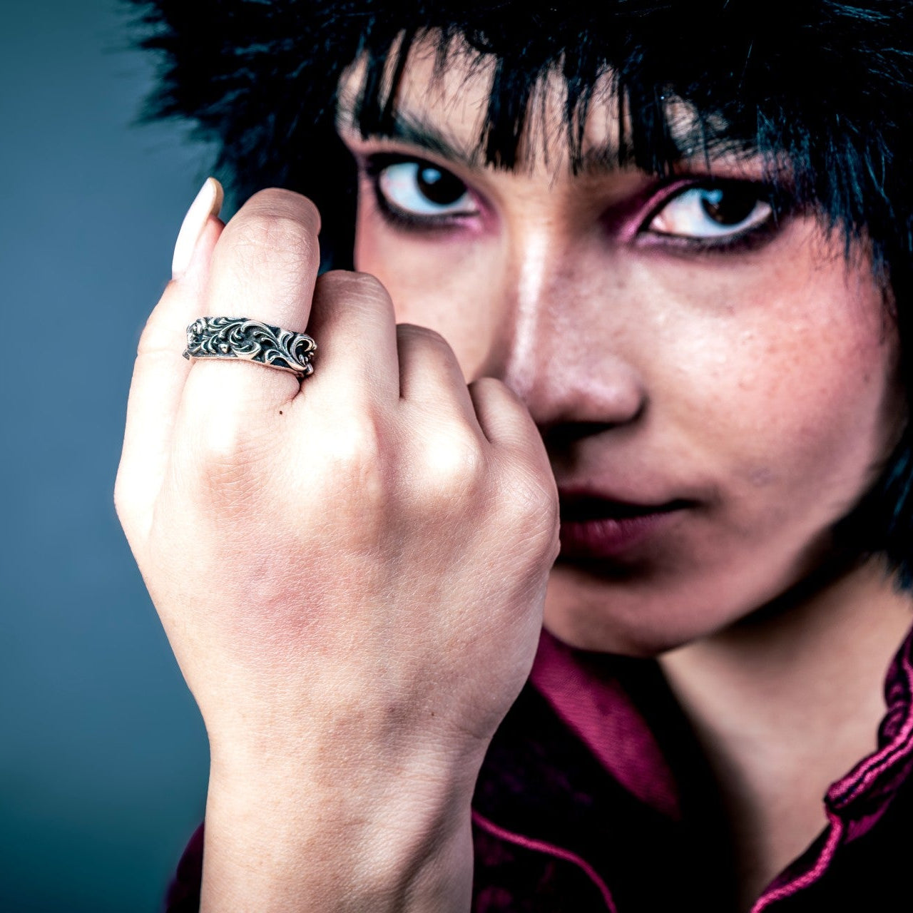 [full] Person with a sterling silver ring on their finger