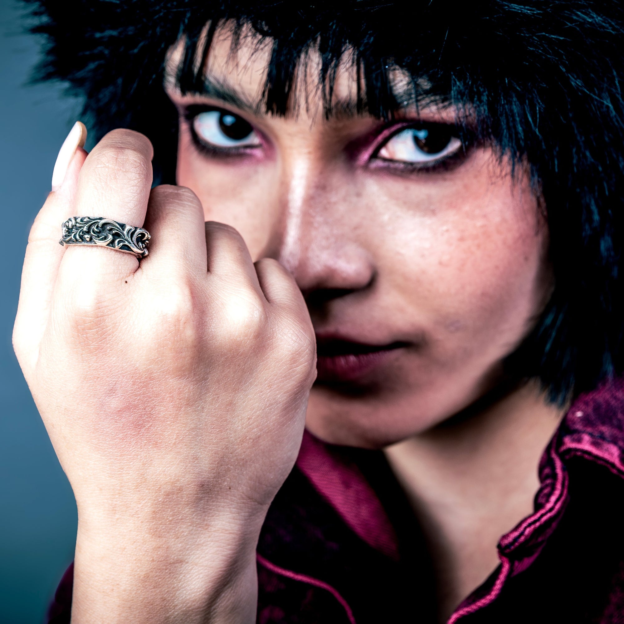 [full] Person with a sterling silver ring on their finger