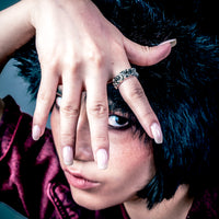 [full] Person with a sterling silver ring on their finger