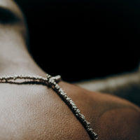 [full]- sterling silver discs with a polished, faceted finish necklace