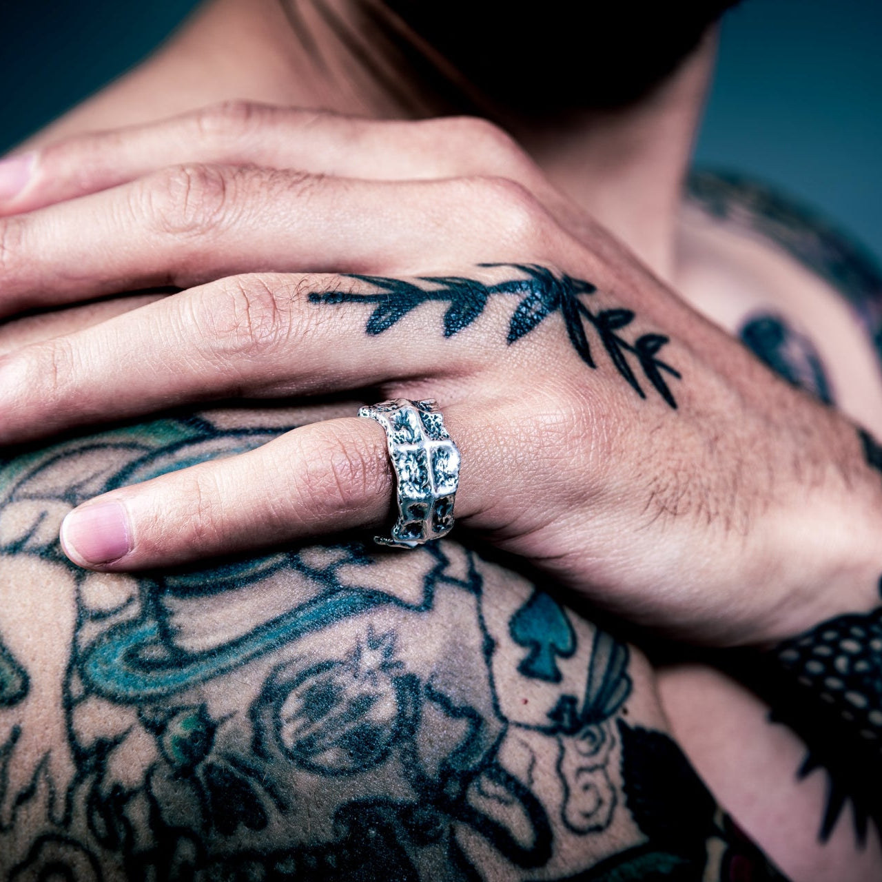 [full] Rugged handmade sterling silver ring featuring a crater-like texture