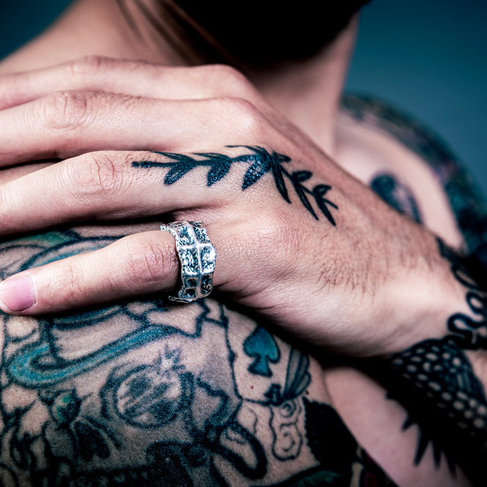 [full] Rugged handmade sterling silver ring featuring a crater-like texture