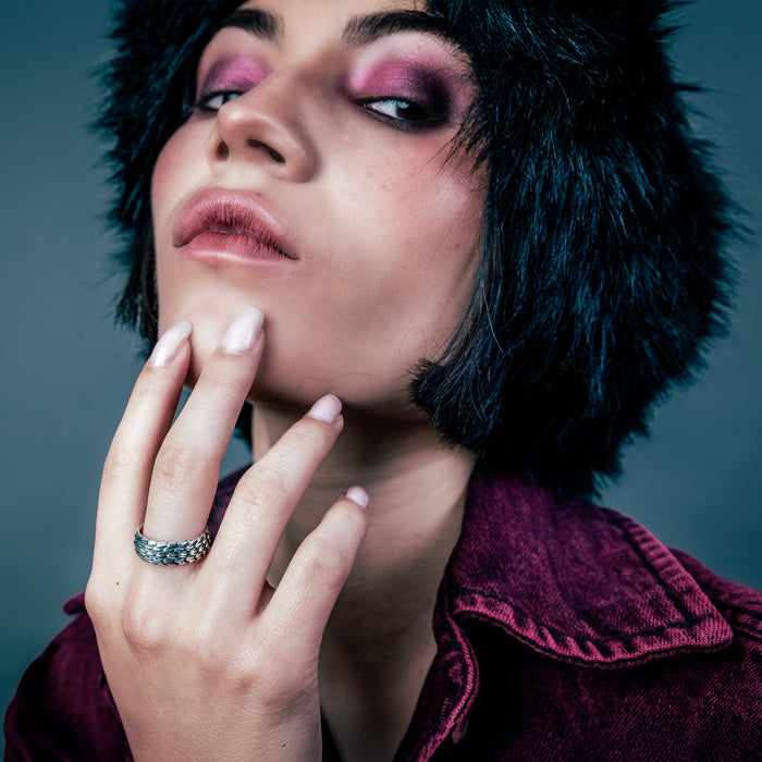 [full] - person wearing sterling silver ring