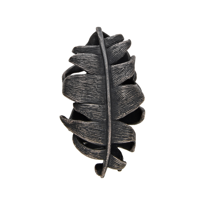 [full] Sterling silver pendant shaped like a wide banana leaf with textured surface.