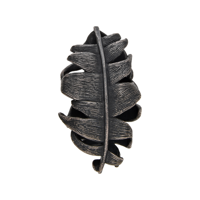 [full] Sterling silver pendant shaped like a wide banana leaf with textured surface.