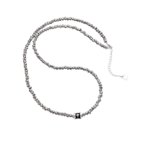 [full] - Sterling silver beaded necklace with a star-like shine and a centerpiece charm.