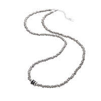 [full] - Sterling silver beaded necklace with a star-like shine and a centerpiece charm.