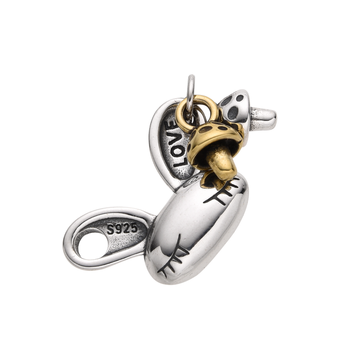 [full] - Sterling silver bone pendant with gold-tone mushroom charm and stitch engraving.