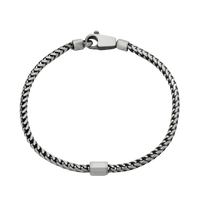[full] - Sterling silver Franco chain bracelet with octagonal centerpiece and dark ruthenium plating.