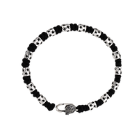 [full] - Sterling silver star bead bracelet with black cord and polished finish.