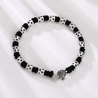 [full] - Sterling silver star bead bracelet with black cord and polished finish.