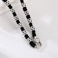 [full] - Sterling silver star-studded beads woven into black handcrafted cord necklace
