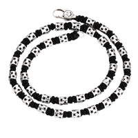 [full] - Sterling silver star-studded beads woven into black handcrafted cord necklace.