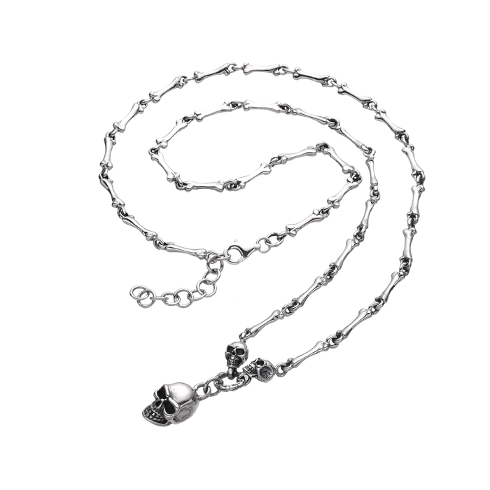 [full] - Sterling silver necklace with bone-shaped links and a detailed skull pendant.