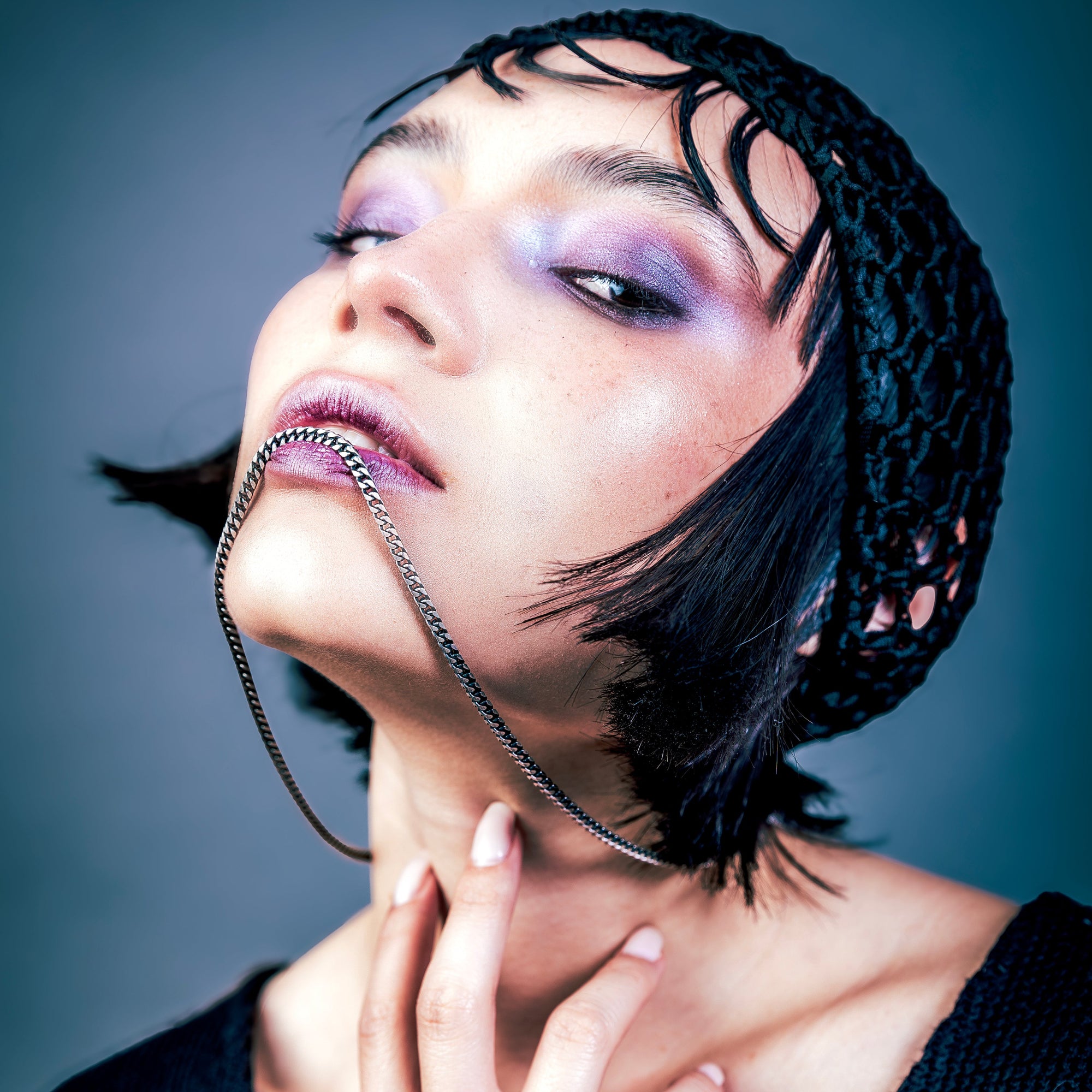 [full] - Woman wearing recon sterling silver with ruthenium plating necklace.
