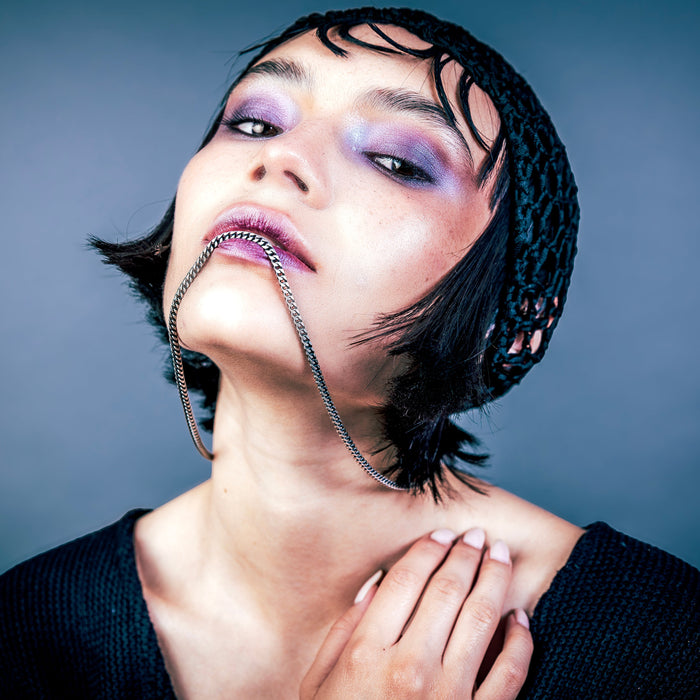 [full] - Woman wearing recon sterling silver with ruthenium plating necklace.