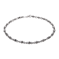 [full] - Sterling silver skull link bracelet with oxidised details and polished highlights.