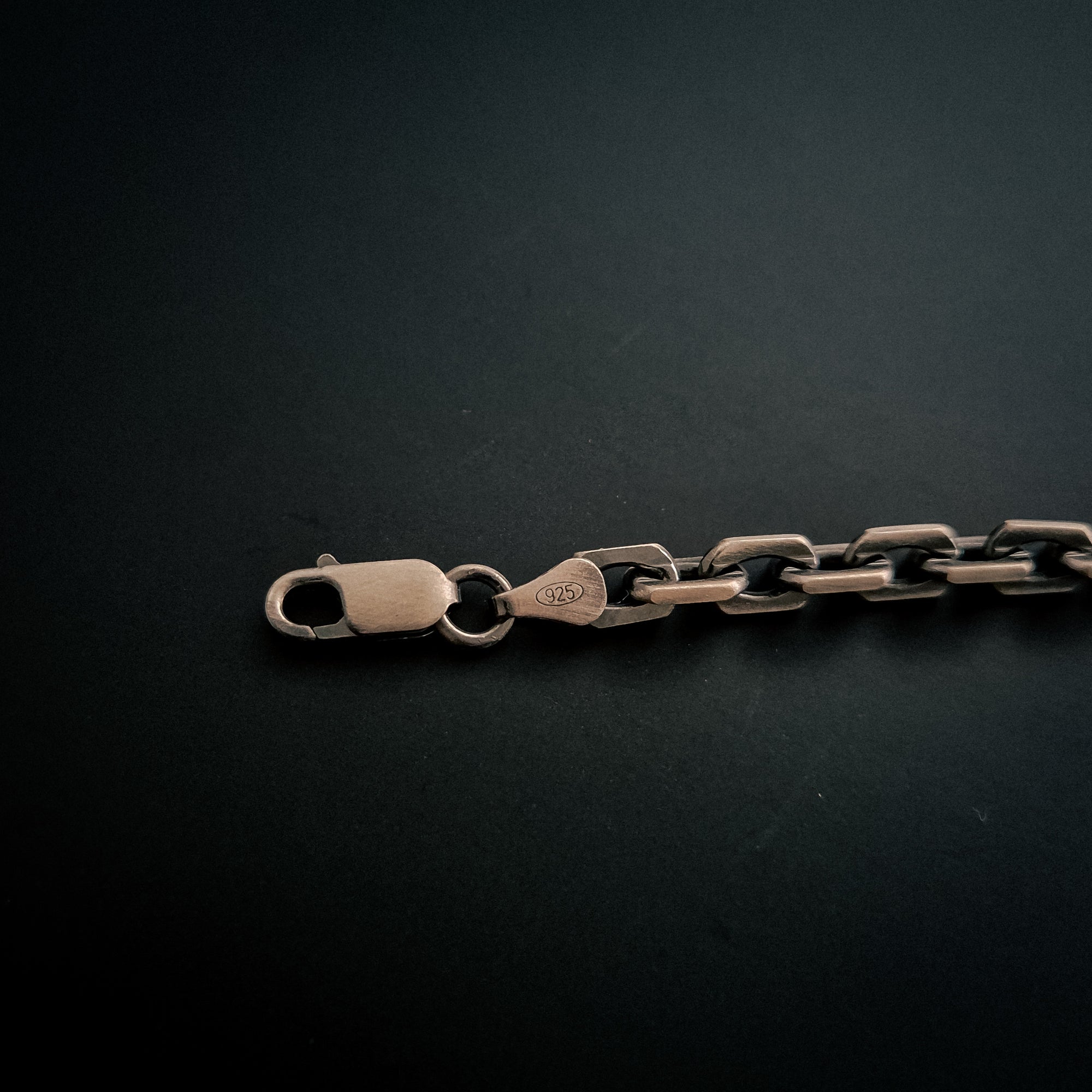 [full] - Sterling silver bracelet featuring ruthenium-plated links with brushed gun-metal texture.