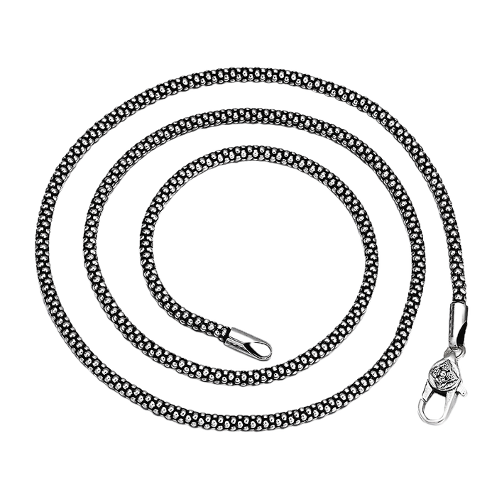 [full] - Sterling silver chain necklace with a textured, scale-like pattern inspired by serpents