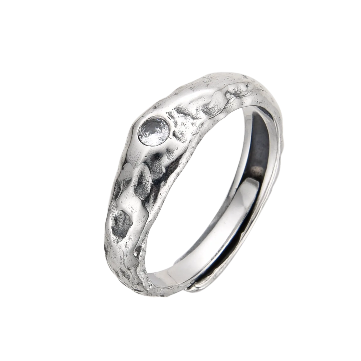 [full] Silver ring with a textured surface on a white background