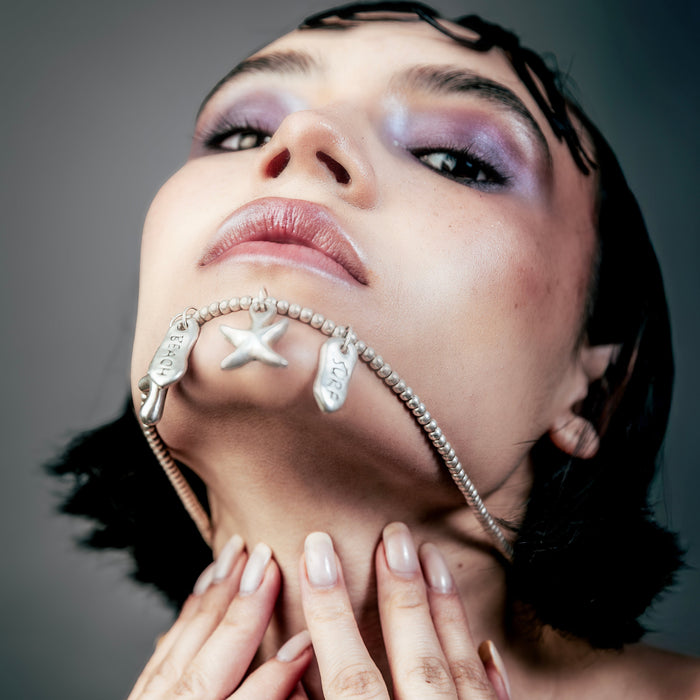[full] - Woman wearing Tidal 999 fine silver