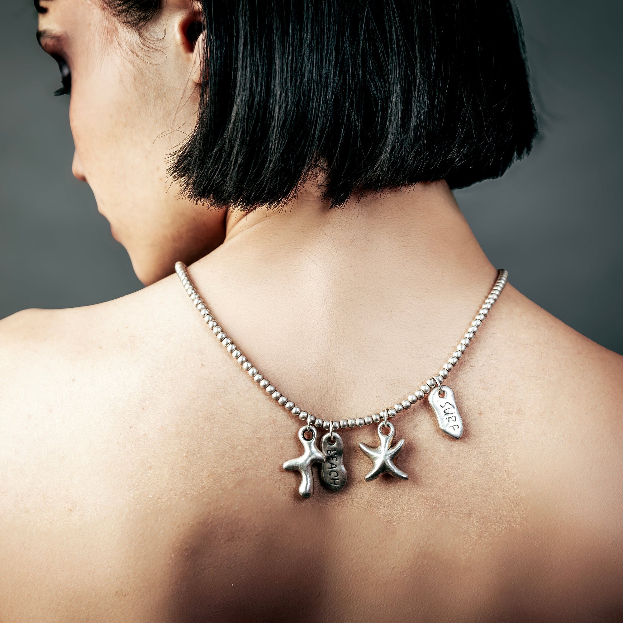 [full] - Woman wearing Tidal 999 fine silver