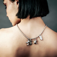 [full] - Woman wearing Tidal 999 fine silver