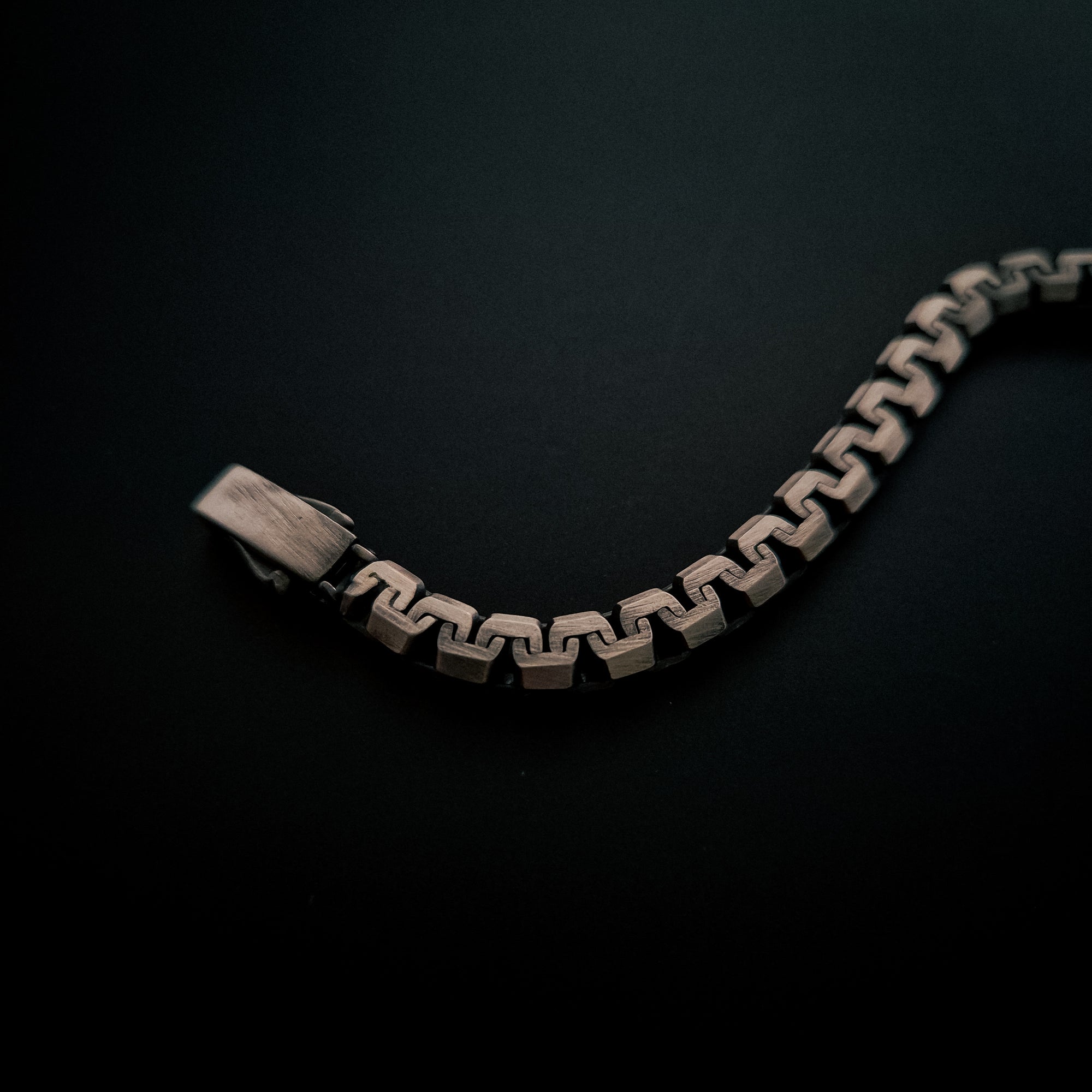 [full] - Industrial-style sterling silver bracelet with ruthenium plating and brushed gun-metal finish.