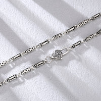 [full] - Geometric sterling silver chain necklace with openwork links and refined clasp