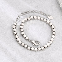 [full] - Faceted sterling silver beads bracelet with geometric design and polished finish.
