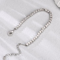 [full] - Faceted sterling silver beads bracelet with geometric design and polished finish.
