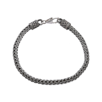 [full] - Braided sterling silver bracelet with oxidised finish and ornate end caps.