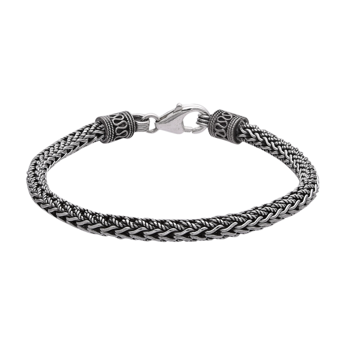 [full] - Braided sterling silver bracelet with oxidised finish and ornate end caps.