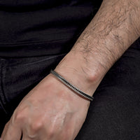 [full] - Fox-tail chain bracelet in sterling silver with diamond-cut links and gun-metal ruthenium plating.