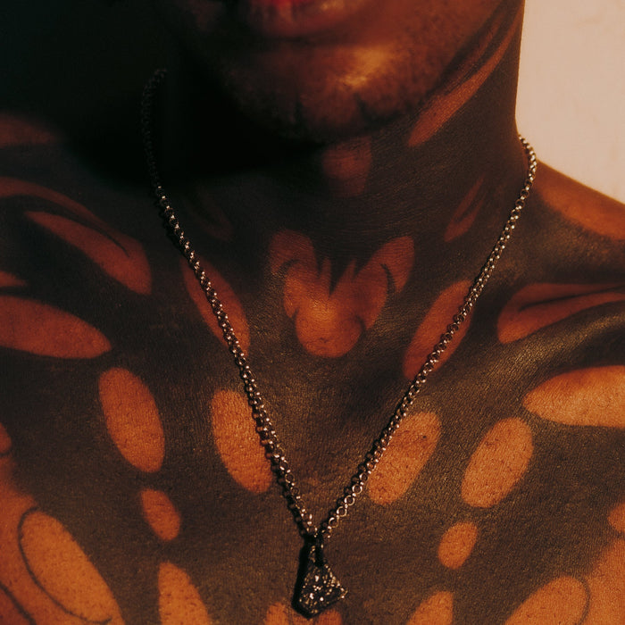 [full]- Sterling silver chain with double interlocking links and an antique silver finish pendant